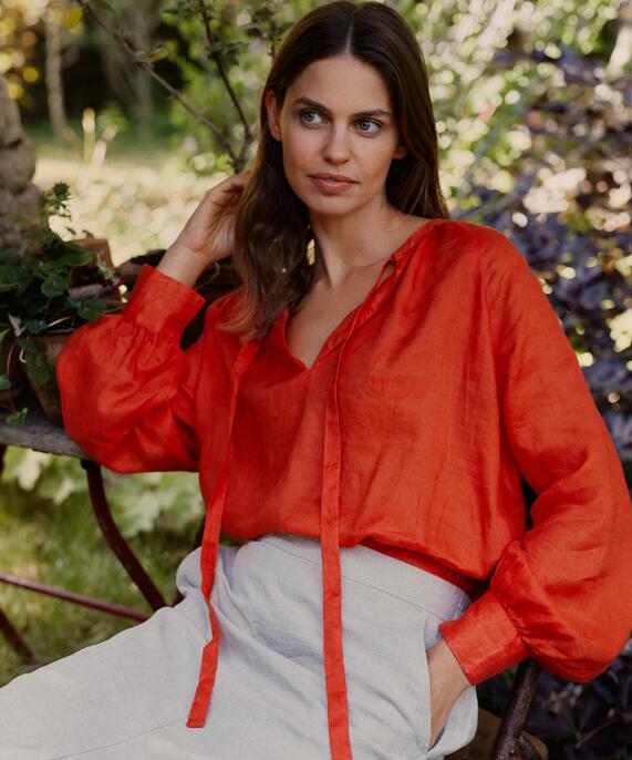 Dortea Blus, Orange com