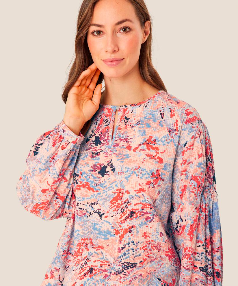 Danette Blus, Orange com