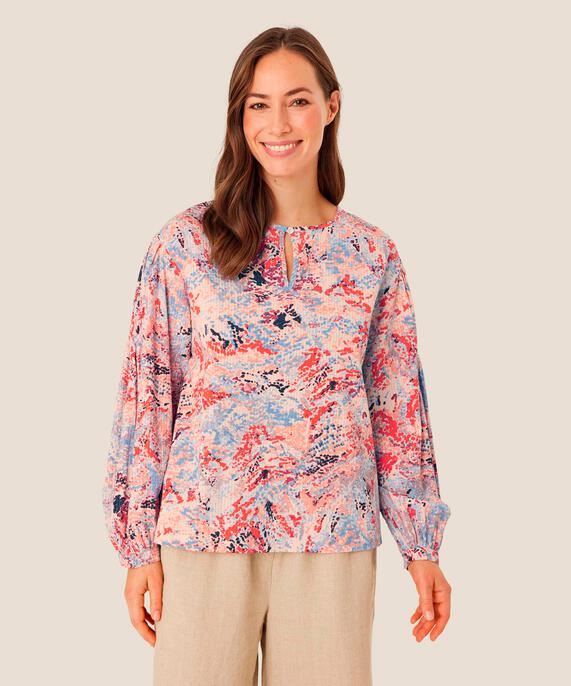 Danette Blus, Orange com