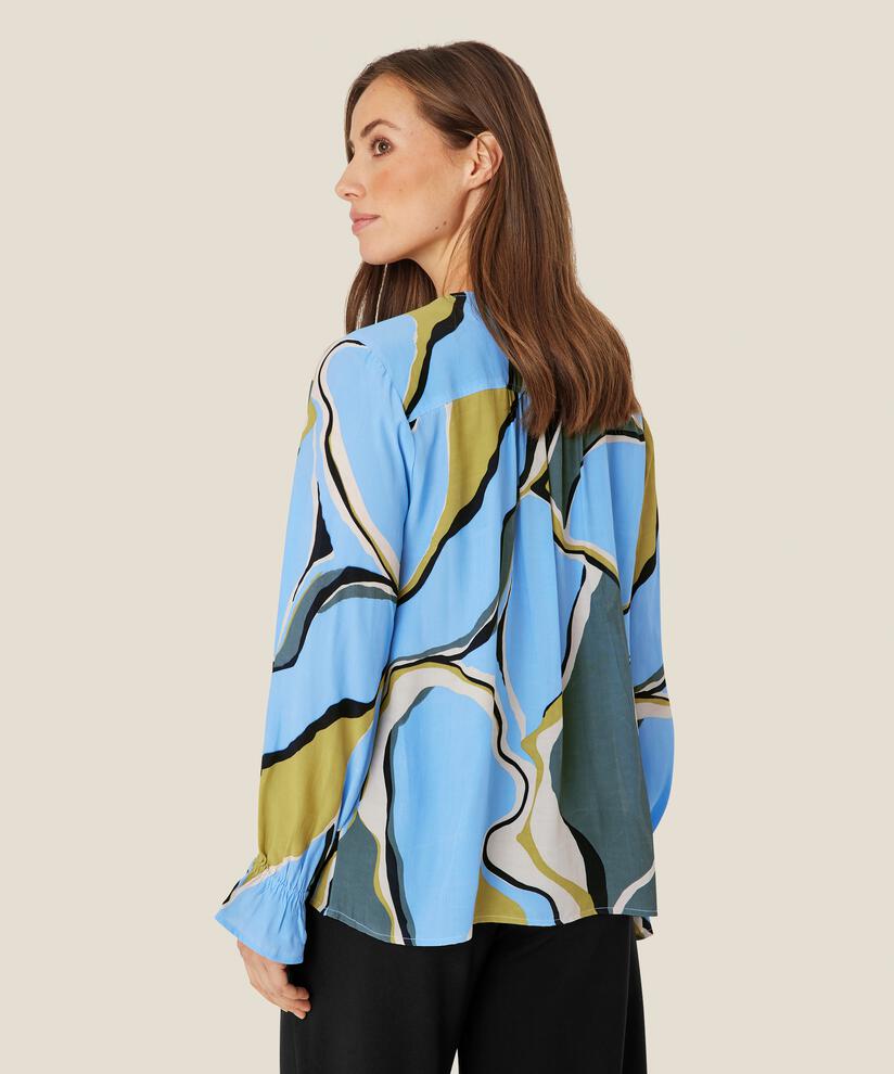 Dahlia Blus, Oasis
