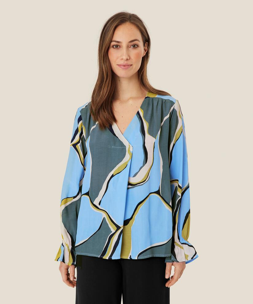Dahlia Blus, Oasis